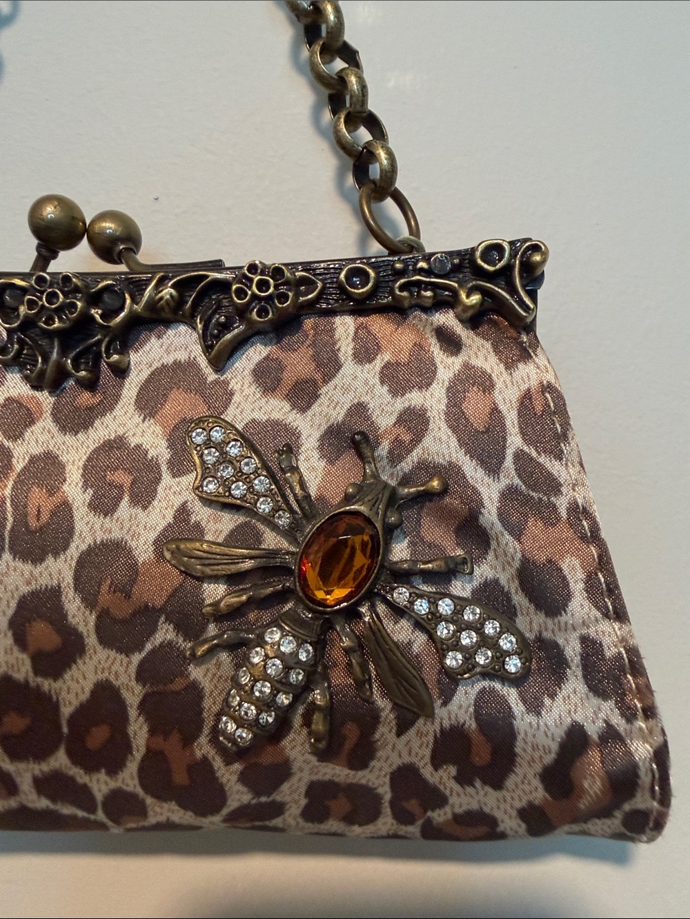Vintage Guess cheetah print satin clutch purse w/ rhinestone bee emblem. - Picture 2 of 6